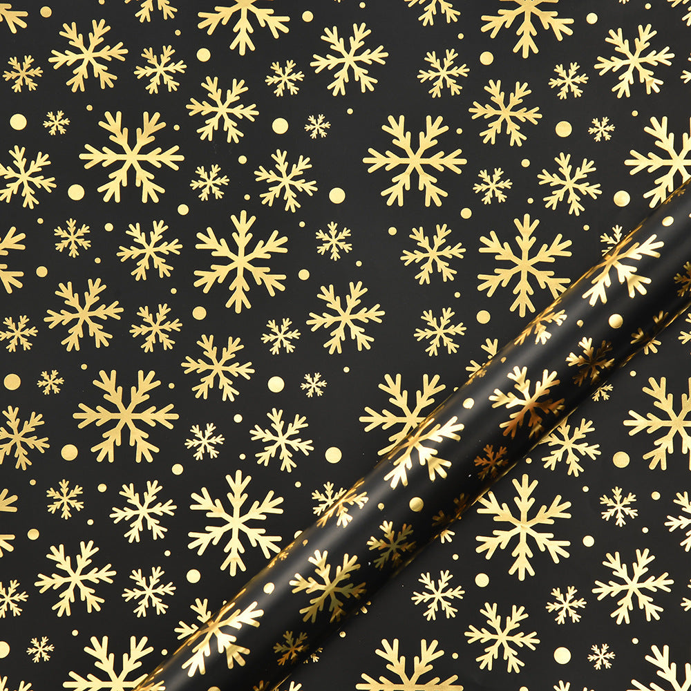 Old World, Vintage Christmas Wrapping Paper, Black/Gold. Designs of Elk, Snowflake.