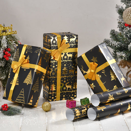 Old World, Vintage Christmas Wrapping Paper, Black/Gold. Designs of Elk, Snowflake.