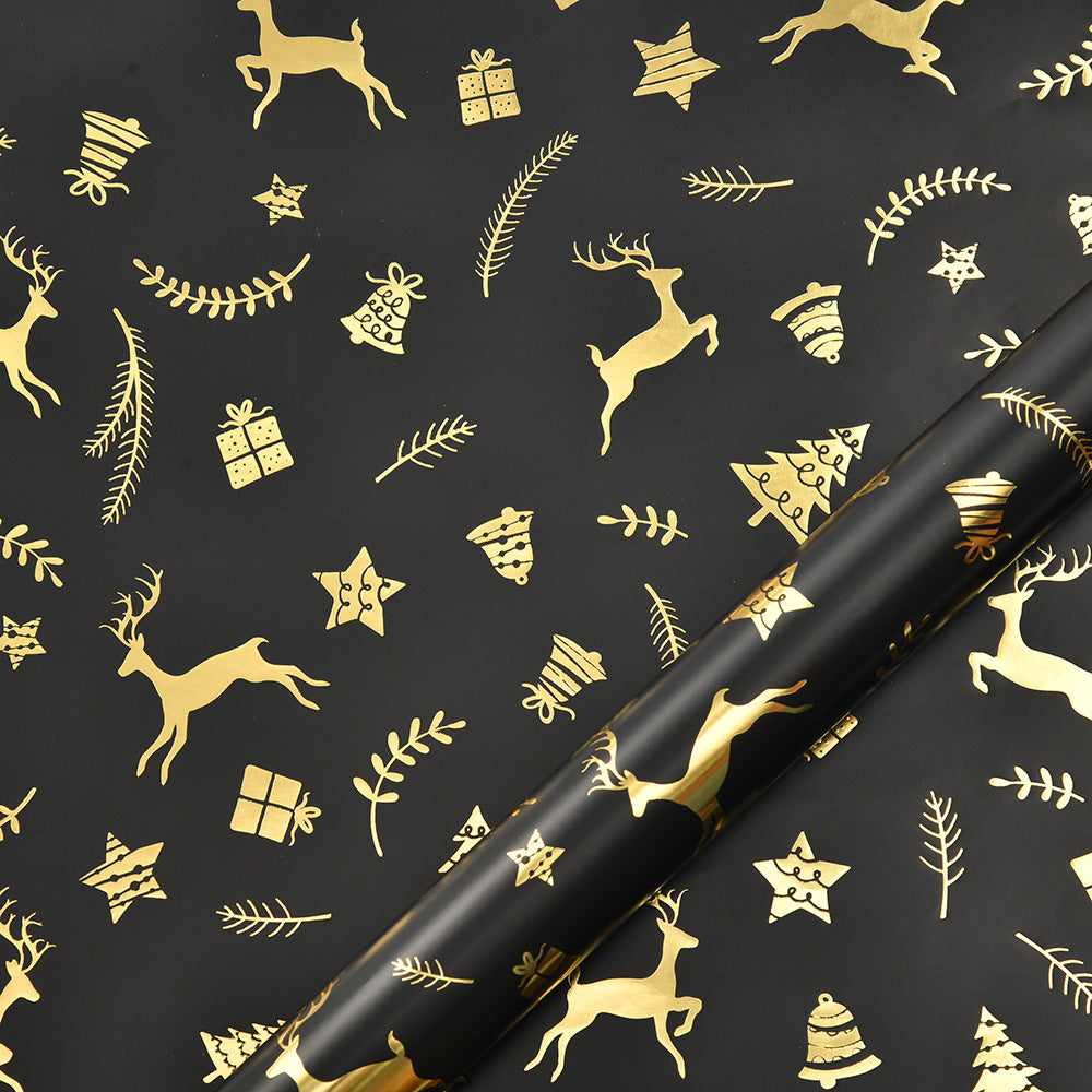 Old World, Vintage Christmas Wrapping Paper, Black/Gold. Designs of Elk, Snowflake.